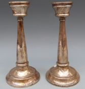 Early to mid 20thC Arts and Crafts or Art Nouveau hallmarked silver candlesticks, marks rubbed,