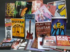 A collection of guitar related and 'How to Play Guitar' books together with 'Dead Gods,