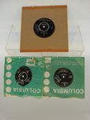 Three collectable Columbia singles.