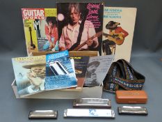 A collection of music tutor books to include harmonica, together with a Meisterklasse Hohner 580,