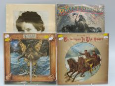 Approximately 100 mostly rock albums including Led Zeppelin, The Beatles, Jethro Tull, Neil Young,