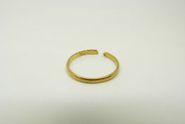 A 22ct gold wedding band, 2.