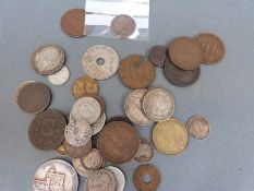 A small amateur collection of UK and overseas coinage to include Charles II farthing,