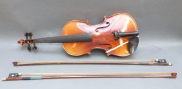 20thC probably Czechoslovakian manufactured violin, with lightly flamed two piece 34cm back,