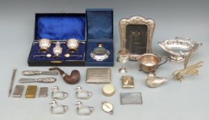 A collection of silver plate items to include picture frame, birds,