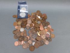 A quantity of coins to include Liberty silver dollar,