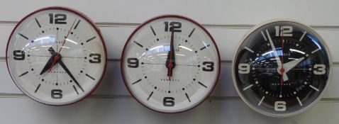 Three Newgate quartz 'bubble' clocks,