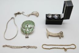 A silver Siam peacock brooch set with enamel, silver dog brooch,
