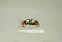A 9ct gold ring set with emeralds and diamonds, size L, 1.8g.