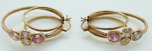 A pair of 9ct gold earrings set with topaz, 6.