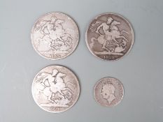 Three George IV crowns 1821 and 1882 together with an 1825 shilling,