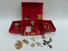 A collection of costume jewellery including abalone pin, enamel brooches, mother of pearl pendant,