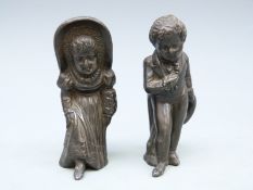A pair of bronze or bronzed Kate Greenaway figures,