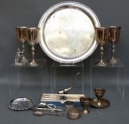 A collection of silver plate to include goblets and tray and two silver napkin rings