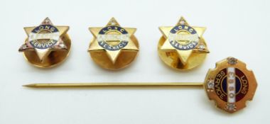 A 9ct gold stick pin for Long Service at Esso set with diamonds and three similar 9ct gold studs,