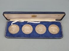 Cased set of four hallmarked silver Winston Churchill medals by Toye Kenning and Spencer,