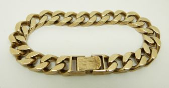 A 9ct gold bracelet made up of large curb links with textured clasp, 72.