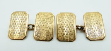 A pair of 9ct gold engine turned cufflinks,