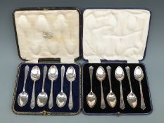 Two cased sets of six hallmarked silver teaspoons,