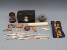 An ivory inlaid and coromandel box 'HMC', containing sewing items,