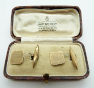 A pair of 9ct gold cufflinks with engine turned decoration, in original box, 3.