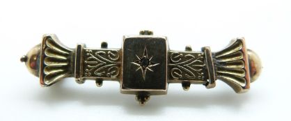 A yellow metal Victorian brooch set with a diamond, 4.