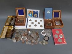 An amateur coin collection including a Sandhill coin folder of Queen Elizabeth II florins and half