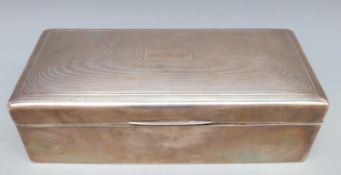 George V hallmarked silver cigarette box engraved to lid Severn, Birmingham 1934,
