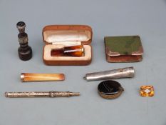 A white metal and turned wood intaglio seal, 9ct gold mounted prayer book,