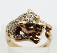 A 9ct gold ring in the form of a leopard set with paste, size M, 5.