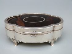 George V hallmarked silver, tortoiseshell lidded trinket or jewellery box of quatrefoil form,