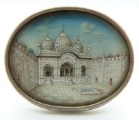 A white metal brooch set with an ivory plaque depicting the Taj Mahal