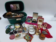 A collection of costume jewellery including brooches, bangles, pendants,