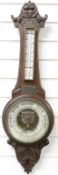 Late 19thC / 20thC aneroid barometer in oak case,