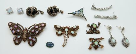 A dragonfly brooch set with synthetic opals, another similar dragonfly brooch,