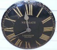 Newgate quartz caseless black dialled wall clock with contrasting Roman numerals,