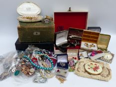 A large collection of jewellery to include amethyst necklace, beads, Stratton compact,