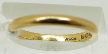 A 22ct gold ring/ wedding band, London 1950, size L, 3.