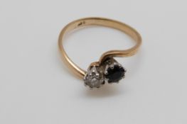 A 9ct gold ring set with a diamond of approximately 0.