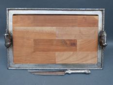 A plated tray with figural boar handles length 47cm, bark effect surround,