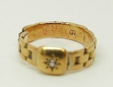 An 18ct gold Victorian ring set with a diamond in a star setting, 3.