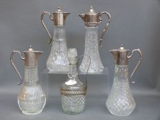 Five various silver plated and glass claret jugs