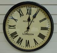 Newgate, London quartz dial wall clock, the ivory coloured dial with bold Roman numerals,