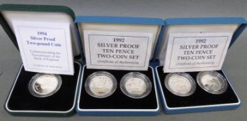 Two cased 1992 ten pence Royal Mint silver proof two coin sets with certificates,