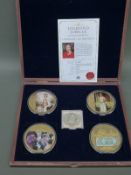 A cased oversized Royal commemorative coin set