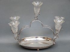 A cut glass and silver plated epergne with tray below, mounted with five cut glass trumpets,