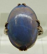 A Victorian 18ct gold ring set with a black opal cabochon, size I, 3.7g.