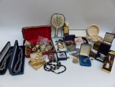 A collection of costume jewellery including silver filigree brooch, silver chains, owl charm,