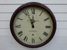A Newgate quartz dial wall clock with Roman numerals in mahogany finish case,
