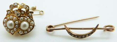 An Edwardian brooch set with seed pearls and a diamond in the form of two hearts and a crown and a